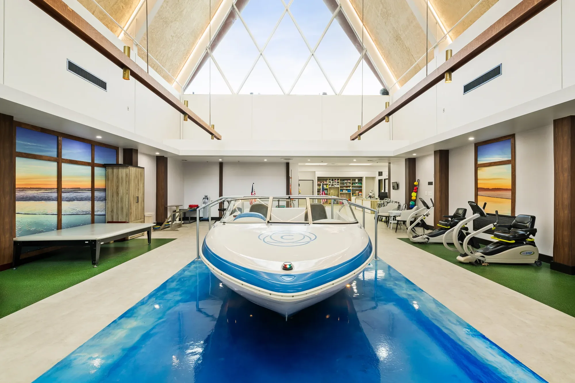 Carlton Shores — therapy gym with a boat set into a blue floor