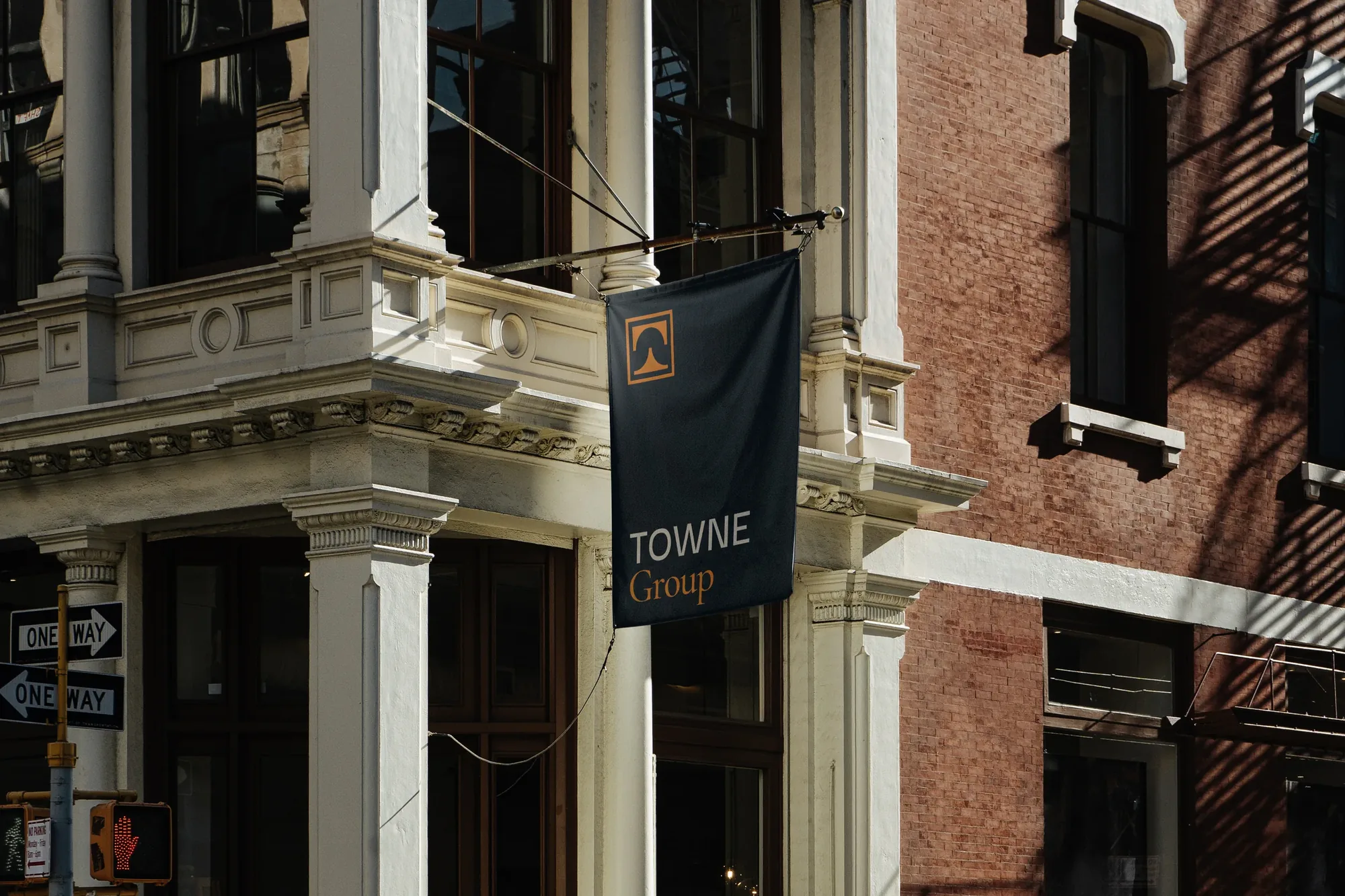 Towne Group — banner flag on a brick building